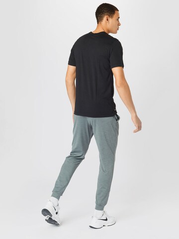 NIKE Tapered Παντελόνι φόρμας σε γκρι