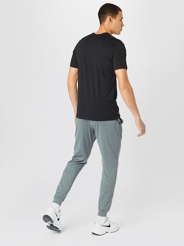 NIKE Tapered Sportbyxa i grå