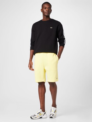 LACOSTE Regular Trousers in Yellow