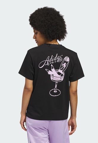 Maglietta di ADIDAS SPORTSWEAR in nero: frontale