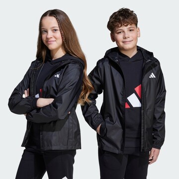 ADIDAS SPORTSWEAR Αθλητικό μπουφάν σε μαύρο: μπροστά