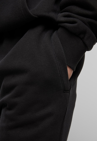 Loosefit Pantalon Urban Classics en noir