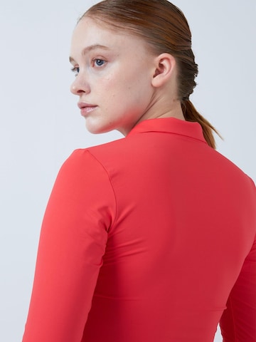 SPORTKIND Performance shirt 'Long Sleeve Polo Shirt' in Orange