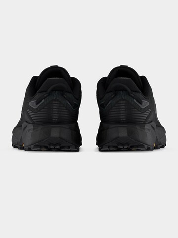 Chaussure de course 'Rebel Trail' new balance en noir