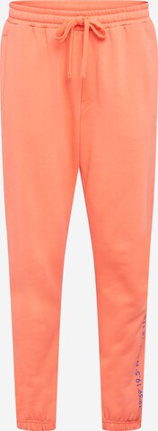 ABOUT YOU x Mero Loose fit Pants 'Code' in Orange: front