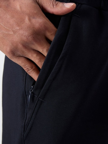 Tommy Life - Tapered Calças de desporto em preto