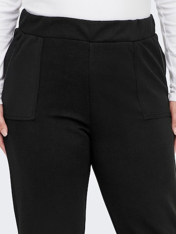 Coupe slim Pantalon ONLY Carmakoma en noir