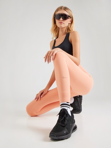 NIKE Skinny Fit Спортен панталон 'ONE' в оранжево