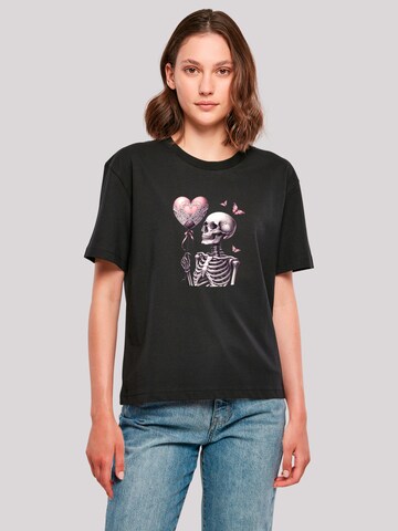 T-shirt 'Skelett hält Herzballon' F4NT4STIC en noir : devant
