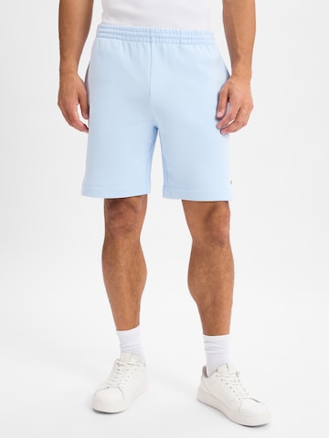 LACOSTE Broek in Blauw: voorkant