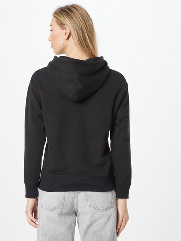 LEVI'S ® Sweatshirt 'LSE Graphic Standard Hoo' in Schwarz