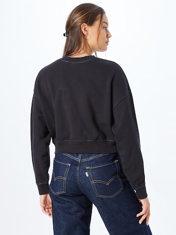 LEVI'S ® Sweatshirt 'Graphic Laundry Crew' in Schwarz