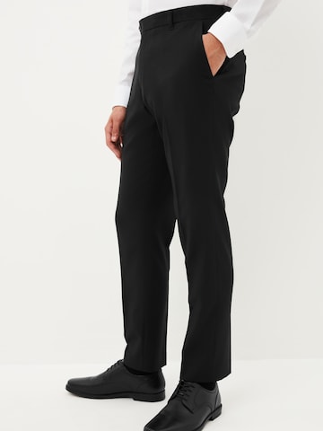 Coupe slim Pantalon à plis Next en noir