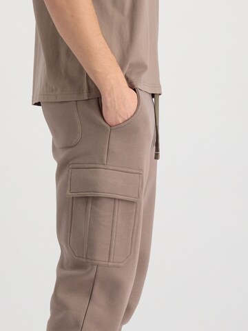 ALPHA INDUSTRIES Tapered Cargo trousers 'Organics' in Brown