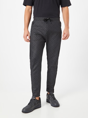 REPLAY Tapered Trousers in Black: front