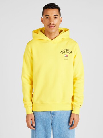TOMMY HILFIGER Sweatshirt 'ARCHED VARSITY' in Yellow: front