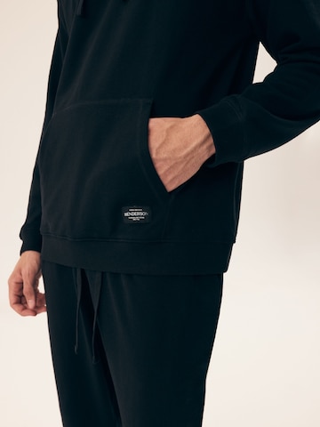 Felpa 'Kapuzensweatshirt Motion, French Terry, mit Rippbündchen' di Henderson in nero