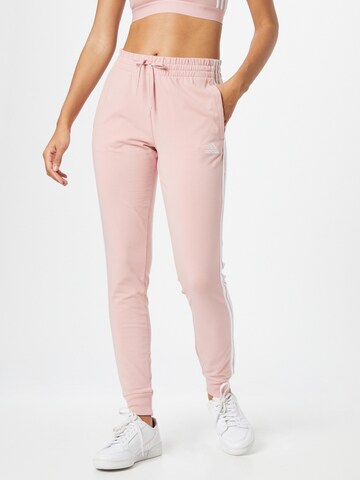 ADIDAS SPORTSWEAR - Tapered Calças de desporto 'Essentials' em rosa: frente