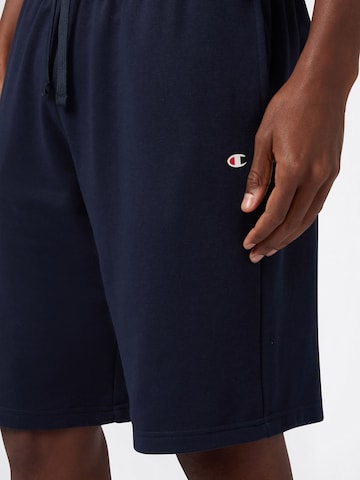 Champion Authentic Athletic Apparel Lużny krój Spodnie w kolorze niebieski