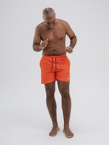 HACOY - Bermudas en naranja: frente
