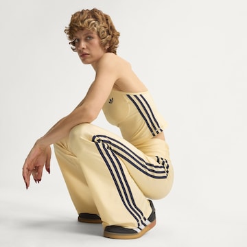 ADIDAS PERFORMANCE Flared Παντελόνι φόρμας 'Superstar' σε κίτρινο