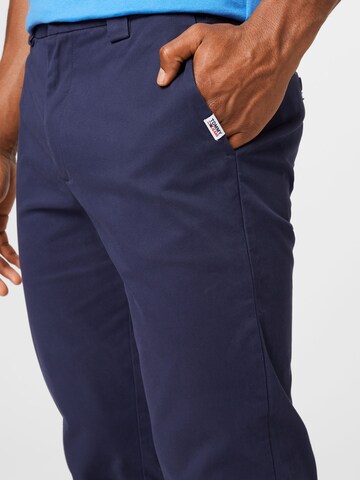 mėlyna Tommy Jeans Prigludęs „Chino“ stiliaus kelnės