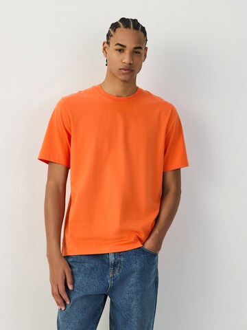 T-Shirt Next en orange : devant