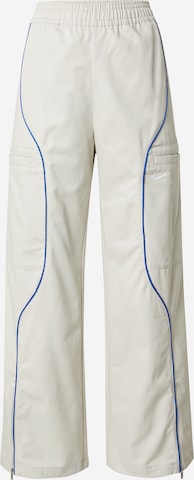 Wide leg Pantaloni di Nike Sportswear in beige: frontale