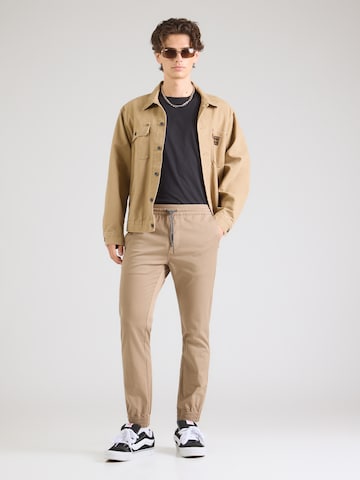 Volcom Конический (Tapered) Штаны 'FRICKIN' в Бежевый