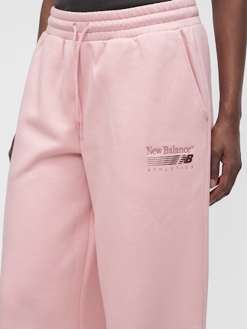 Wide leg Pantaloni di new balance in rosa