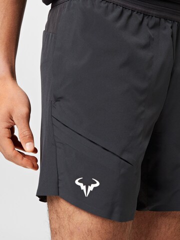 Regular Pantalon de sport 'RAFA' NIKE en noir