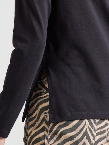 ONLY - Camiseta 'ONLKISS' en negro