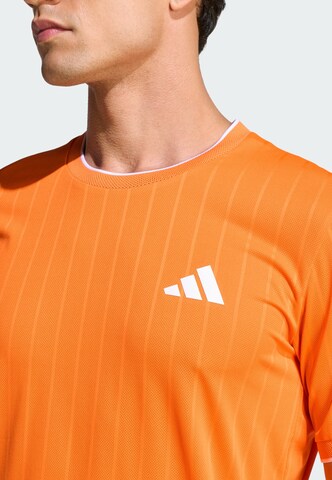 ADIDAS PERFORMANCE - Camiseta funcional 'Freelift Pro' en naranja