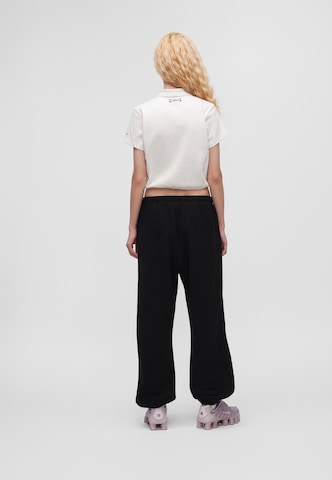 Tapered Pantaloni 'Studio Fleece' di Nike Sportswear in nero