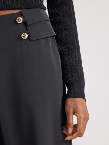 GUESS by Marciano Zvonové kalhoty Kalhoty 'Whitney' – černá