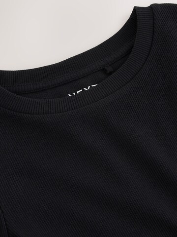 Next - Camiseta en negro
