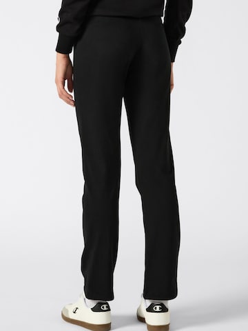 Champion Authentic Athletic Apparel Tapered Hosen in Schwarz