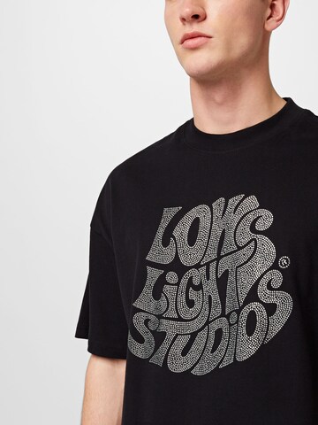 Low Lights Studios T-shirt 'Rhine' i svart