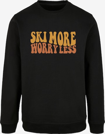 Sweat-shirt 'Ski More Worry Less' F4NT4STIC en noir : devant
