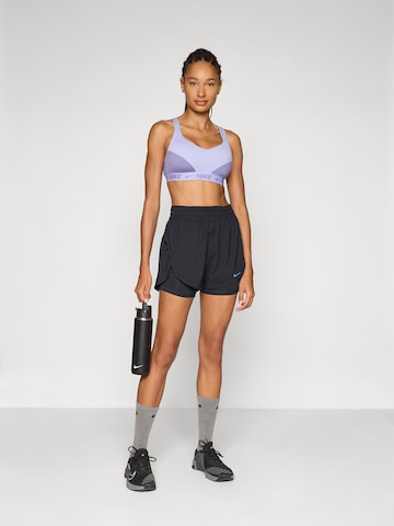 NIKE Bustier Biustonosz sportowy 'Indy' w kolorze fioletowy