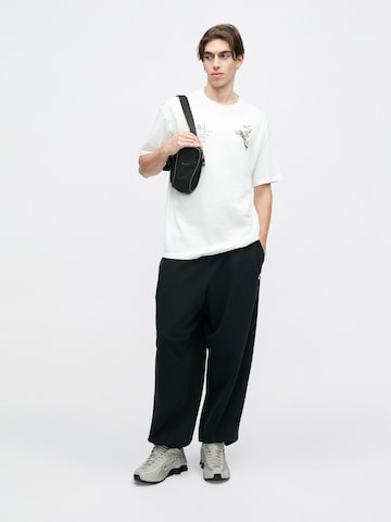 Nike Sportswear Μπλουζάκι 'M90 OC WINGS VICTORY' σε λευκό