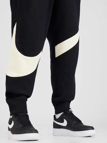 Nike Sportswear Дънки Tapered Leg Панталон в черно