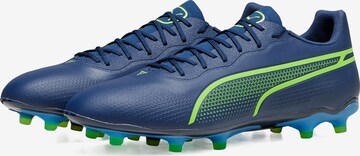 Ghete de fotbal 'King Pro' de la PUMA pe albastru