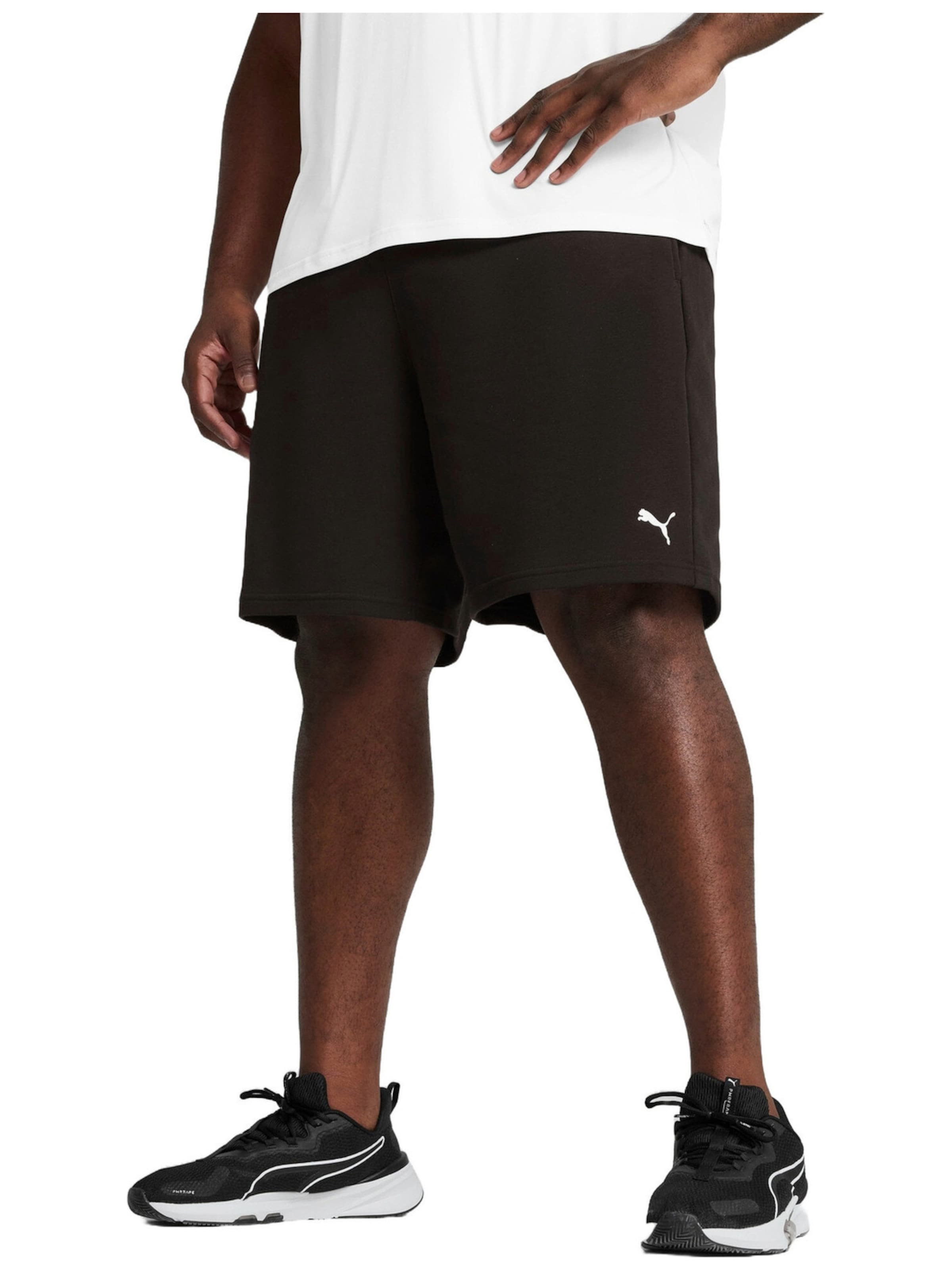 PUMA - regular Pantalón deportivo 'Puma M Tad Essentials 8 Knit Short' en negro: frente