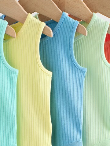 Next Kezeslábas - vegyes színek