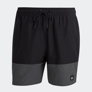 ADIDAS PERFORMANCE Board Shorts in Black: front