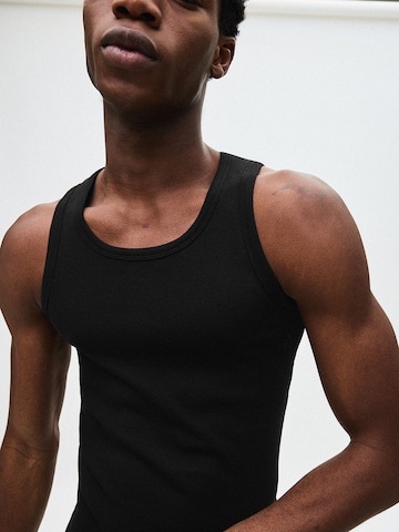 Bershka Bluser & t-shirts i sort