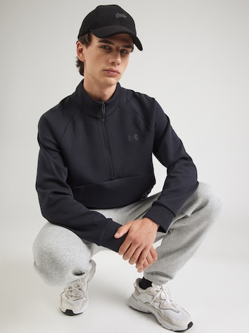 UNDER ARMOUR Sportsweatshirt 'Unstoppable' in Zwart: voorkant