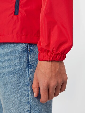 Veste mi-saison Tommy Jeans en rouge