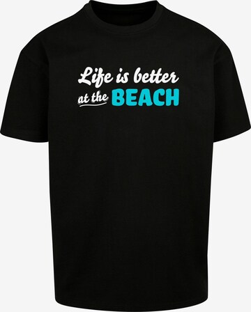 Merchcode Shirt 'Summer - Life Is Better At The Beach' in Zwart: voorkant